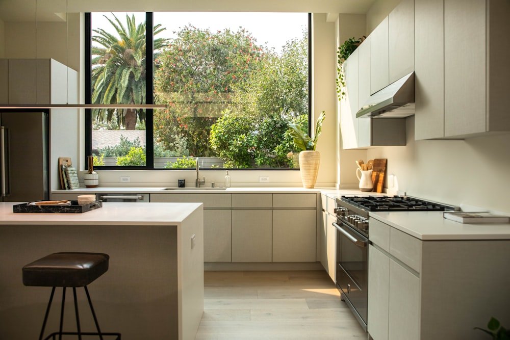 white microwave oven on brown wooden kitchen cabinet